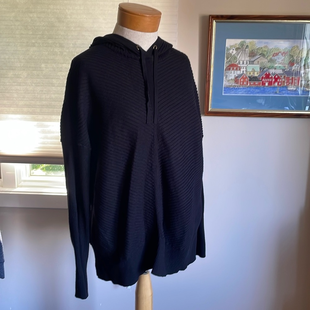 Black hooded sweater